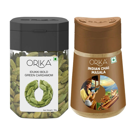 Two Orika spice containers, one idukki green cardamom and one indian chai masala, on a white background.